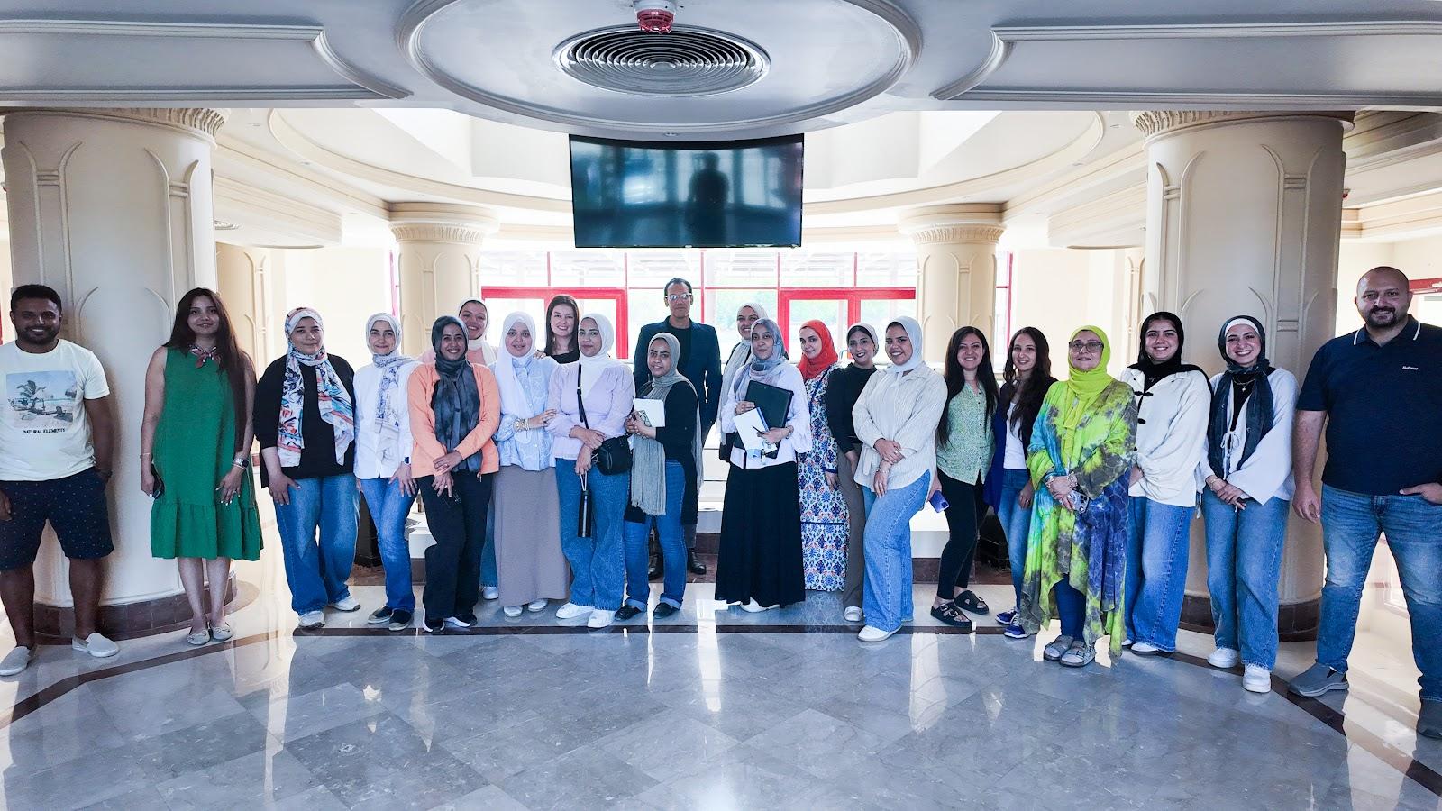 Teachers from the International School of Egypt in the school lobby.